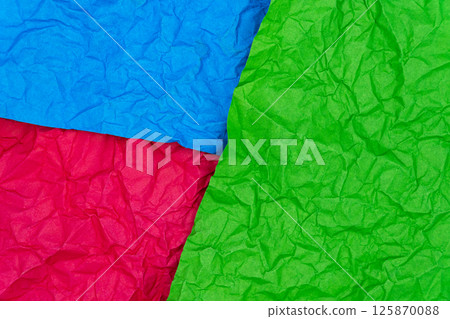 Multicolored crumpled paper texture background. Wrinkled paper surface for designs 125870088