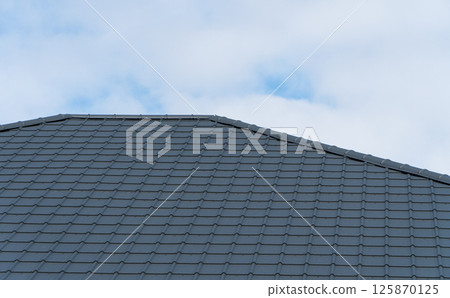 Close up of new house roof structure covered 125870125
