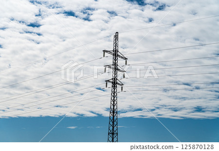 Electricity transmission power lines. High voltage tower 125870128