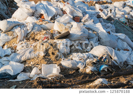 Pile of construction debris. Bags with construction debris. Construction waste Pile of construction debris. Bags with construction debris. Construction waste 125870188