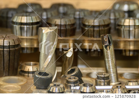 Close-up scene the used flat nose or square solid end mill tools. 125870928