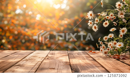 Empty wooden table with autumn white flower background. 125871092