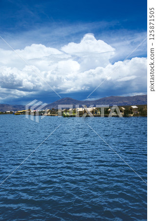 Totora boat on the Titicaca lake near Puno, Peru 125871505