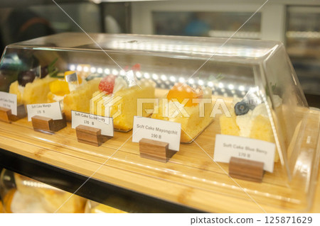 Cakes arranged 125871629