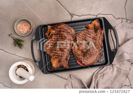 Grilled beef steaks Grilled beef steaks 125872827