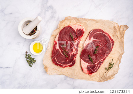 Raw beef steak Raw beef steak 125873224