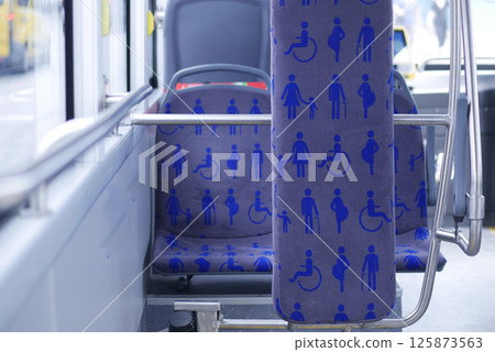 Seating area designed for accessibility on public transport bus 125873563