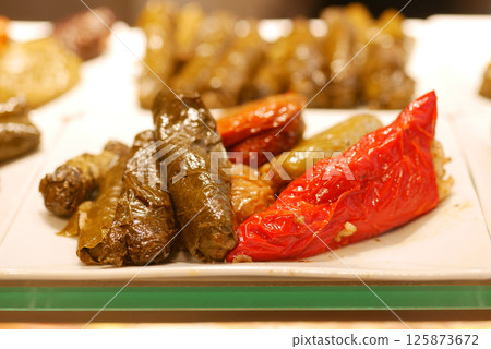 Colorful traditional stuffed vegetables displayed on a plate 125873672