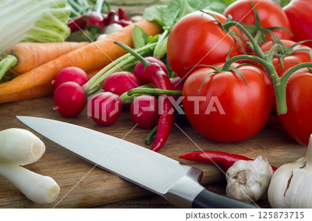 Vegetables on cutting board 125873715