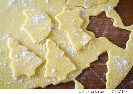 Christmas dough with baking ingredient Christmas dough with baking ingredient 125873774