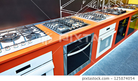 Modern gas stoves in store Modern gas stoves in store 125874054