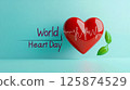 A heart on a blue background with text. World Heart Day 125874529