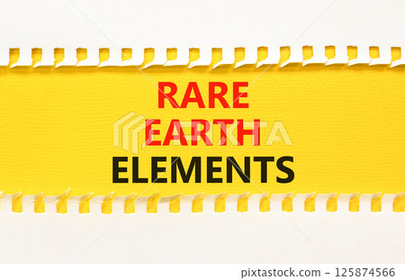 Rare earth elements symbol. Concept words Rare earth elements on beautiful yellow paper on clothespin. Beautiful white paper background. Business and rare earth elements concept. Copy space. 125874566