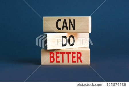 Can do better symbol. Concept words Can do better on beautiful wooden block. Beautiful grey table grey background. Business and can do better concept. Copy space. 125874586