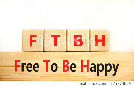 FTBH Free To Be Happy symbol. Concept word FTBH Free To Be Happy on beautiful wooden blocks. Beautiful white background. Business motivational FTBH Free To Be Happy concept. Copy space. 125874699