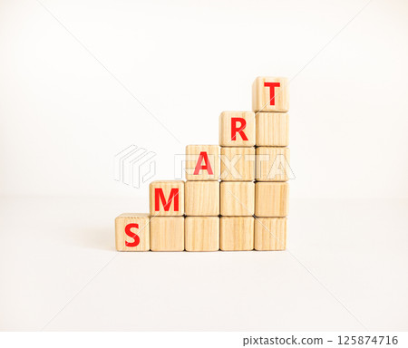 Smart symbol. Concept word Smart on beautiful wooden blocks. Beautiful white table white background. Business lifestyle smart concept. Copy space. Smart symbol. Concept word Smart on beautiful wooden blocks. Beautiful white table white background. Business lifestyle smart concept. Copy space. 125874716
