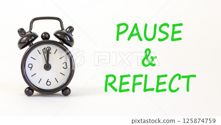 Pause and reflect symbol. Concept words Pause and reflect on beautiful white paper. Alarm clock. Beautiful white paper background. Business motivational lifestyle pause and reflect concept. Copy space Pause and reflect symbol. Concept words Pause and reflect on beautiful white paper. Alarm clock. Beautiful white paper background. Business motivational lifestyle pause and reflect concept. Copy space 125874759