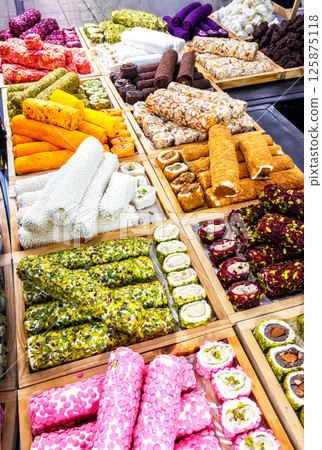 Assorted traditional eastern desserts. Turkish sweet baklava. Arabian sweets. Oriental sweets rahat lokum Assorted traditional eastern desserts. Turkish sweet baklava. Arabian sweets. Oriental sweets rahat lokum 125875118