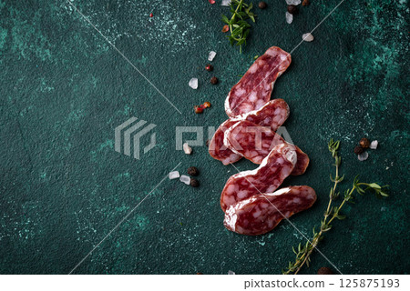 Salami sausage fuet with spice 125875193