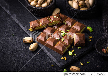 Dubai chocolate with kadayif pistachio filling 125875222