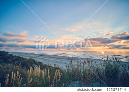 Colorful evening at the danish coast at Blokhus Colorful evening at the danish coast at Blokhus 125875744