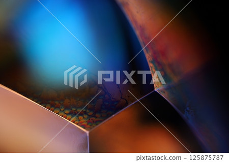 Bright rainbow reflection of liquid, blue and green colours, surrealistic pattern Bright rainbow reflection of liquid, blue and green colours, surrealistic pattern 125875787