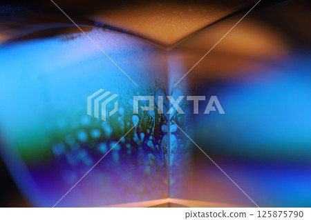 Bright rainbow reflection of liquid, blue and green colours, surrealistic pattern Bright rainbow reflection of liquid, blue and green colours, surrealistic pattern 125875790