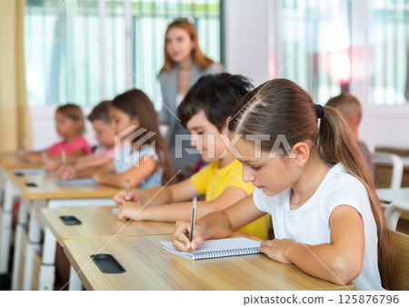 Pupils in classroom 125876796