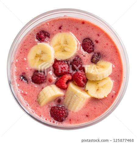 Healthy banana raspberry smoothie, creamy pink blend, view from the top, natural beverage Healthy banana raspberry smoothie, creamy pink blend, view from the top, natural beverage 125877468