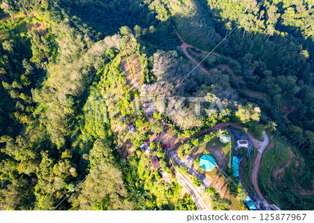 Aerial view landscape mountains background,Amazing nature mountains with campground at Phang Nga Thailand Aerial view landscape mountains background,Amazing nature mountains with campground at Phang Nga Thailand 125877967