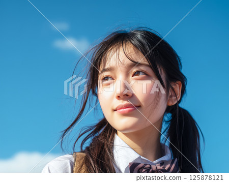 School girls looking up at the sky School girls looking up at the sky 125878121