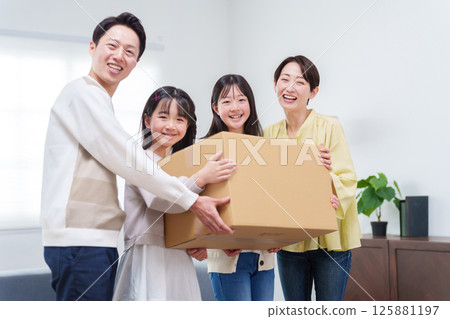 Family packing for moving Family packing for moving 125881197