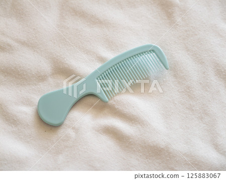 Brushing techniques hair care essentials home image guide indoor setting close-up self-care tips Brushing techniques hair care essentials home image guide indoor setting close-up self-care tips 125883067