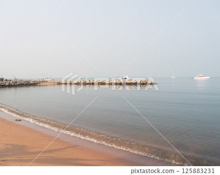 Calm morning the beach scenic waterfront serene environment wide view tranquility 125883231