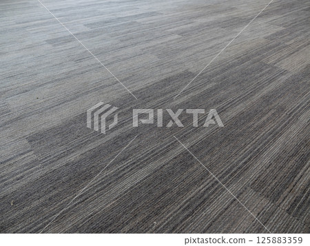 Modern grey flooring installation indoor space home improvement minimalist environment angled view 125883359