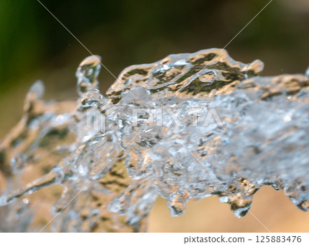 Water splashing action natural setting close-up outdoor environment dynamic viewpoint 125883476