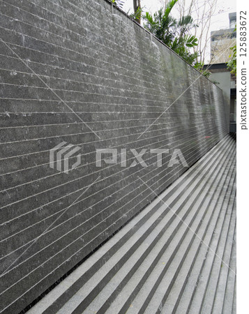 Modern architectural wall design urban setting outdoor environment minimalist aesthetic 125883672