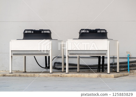 Cooling units installation industrial setting equipment outdoor side view technology insights 125883829