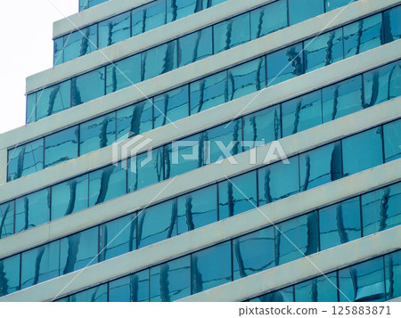 Modern architectural reflection urban city contemporary environment upward angle design concept Modern architectural reflection urban city contemporary environment upward angle design concept 125883871