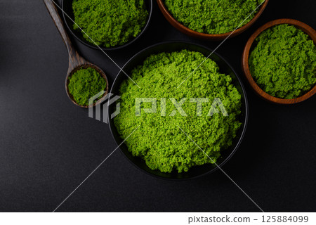 Wolffia or watermeal on black background Wolffia or watermeal on black background 125884099