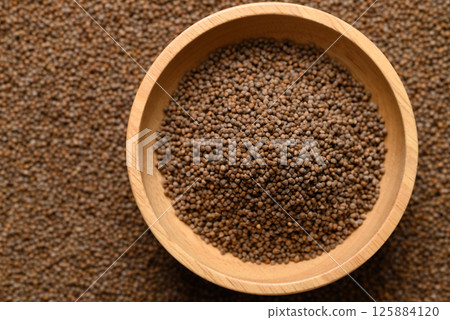 Perilla seed in wooden bowl, Food ingredient, Top view 125884120
