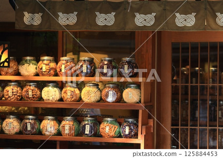 A long-established rice cracker shop's storefront: Bottled rice crackers and rice crackers 125884453