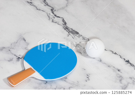 Table tennis racket and ping pong ball 125885274