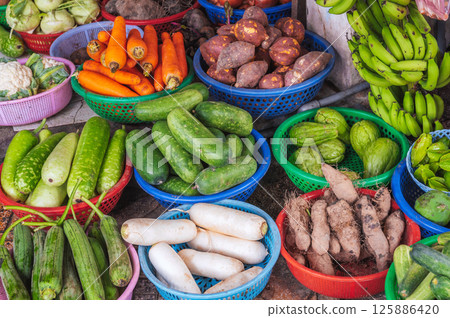 assortment of fresh vegetables at the street market in Vietnam in Asia assortment of fresh vegetables at the street market in Vietnam in Asia 125886420