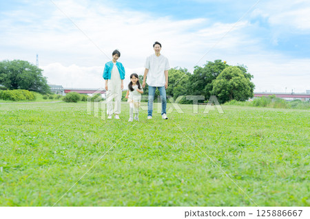 Families playing in the park 125886667