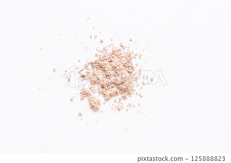 A sample of dry cosmetic clay for a mask or cosmetic powder. White background A sample of dry cosmetic clay for a mask or cosmetic powder. White background 125888823