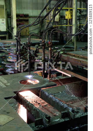 Machine for gas cutting of extra-thick steel plates at a steelworks. Cutting Machine for gas cutting of extra-thick steel plates at a steelworks. Cutting 125889115