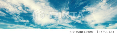 Blue sky with clouds. Cloudy sky background. Horizontal banner 125890583