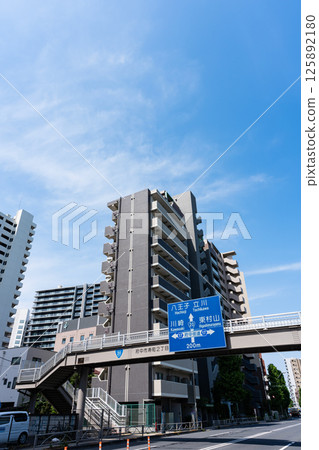 North exit of Fuchu Station on the Keio Line, looking west from Koshu Kaido, spring blue sky, Miyacho, Fuchu City, Tokyo North exit of Fuchu Station on the Keio Line, looking west from Koshu Kaido, spring blue sky, Miyacho, Fuchu City, Tokyo 125892180