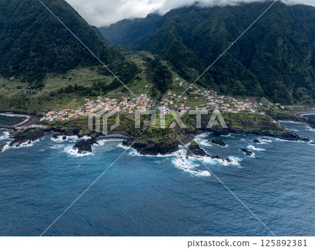 Aerial view of Madeira island . Land meets ocean in Seixal, Madeira , Portugal 125892381
